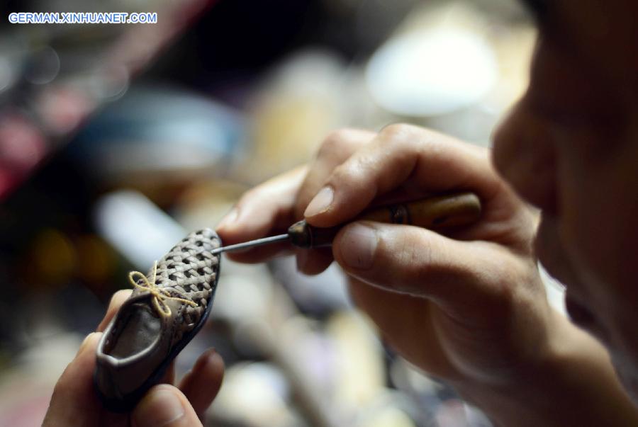 CHINA-JINAN-SHOEMAKER-ART (CN)