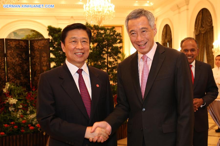 (CORRECTION)SINGAPORE-NATIONAL DAY PARADE-REPRESENTATIVES-LUNCH