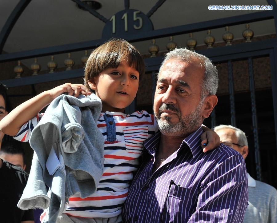（国际）（3）叙利亚“被绊倒”难民抵达西班牙