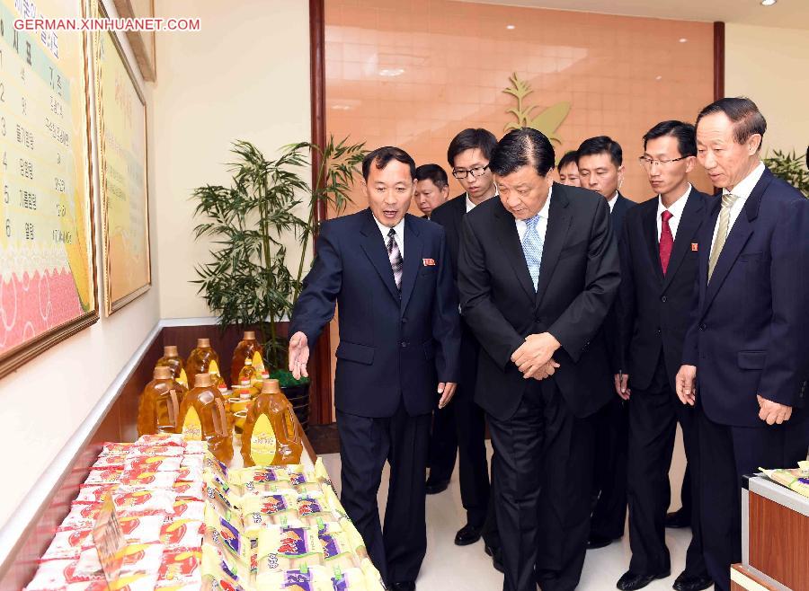 DPRK-CHINA-LIU YUNSHAN-FACTORY-VISIT 