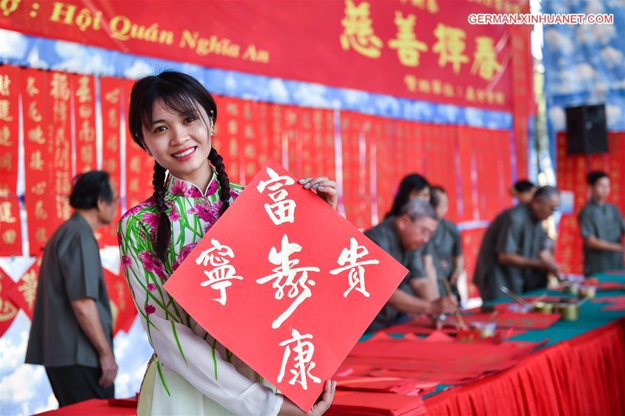 VIETNAM-HO CHI MINH CITY-CHINESE NEW YEAR-POSTERS AND COUPLETS-CHARITY EVENT