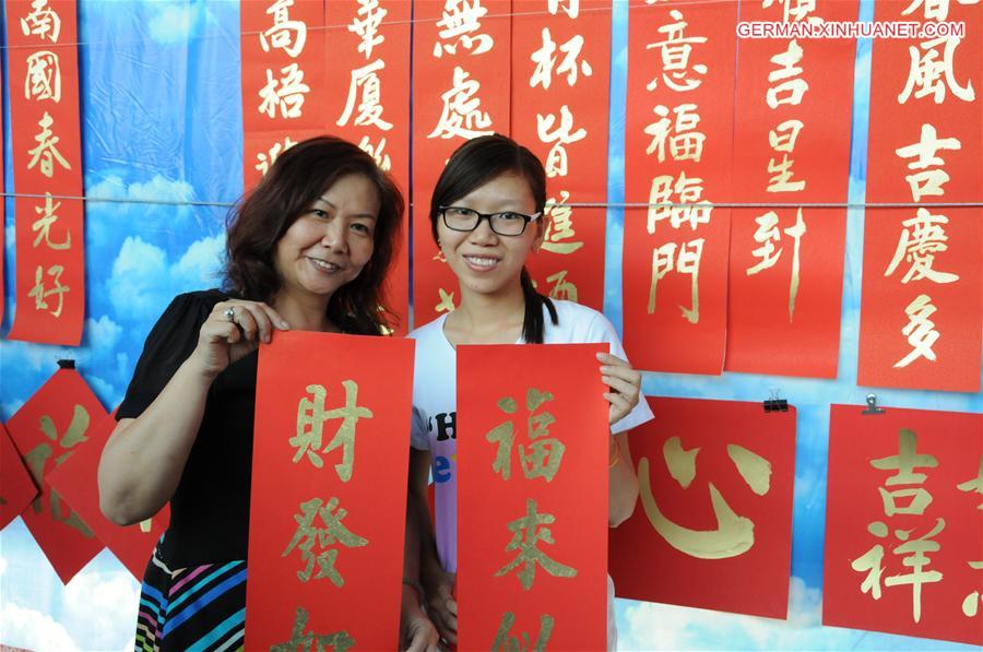 VIETNAM-HO CHI MINH CITY-CHINESE NEW YEAR-POSTERS AND COUPLETS-CHARITY EVENT