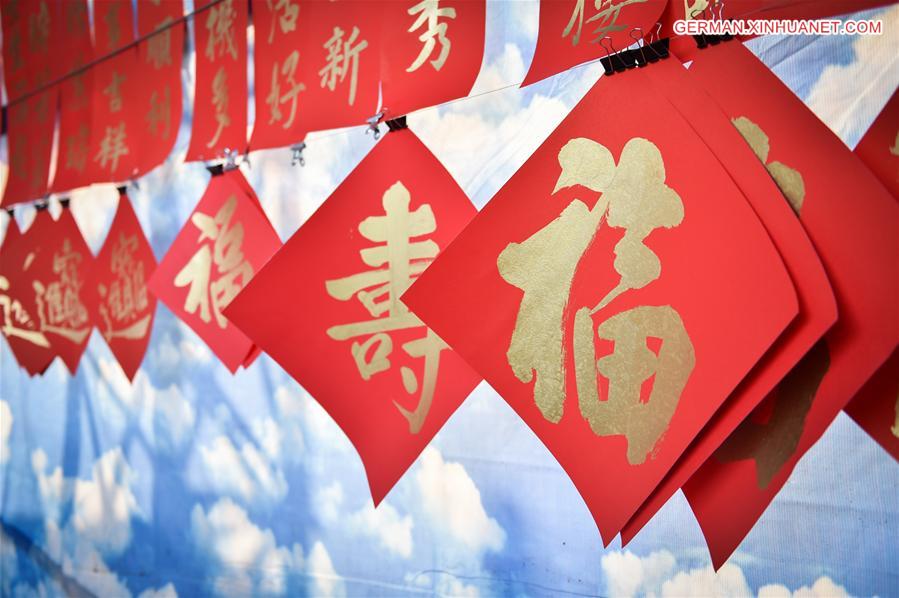 VIETNAM-HO CHI MINH CITY-CHINESE NEW YEAR-POSTERS AND COUPLETS-CHARITY EVENT