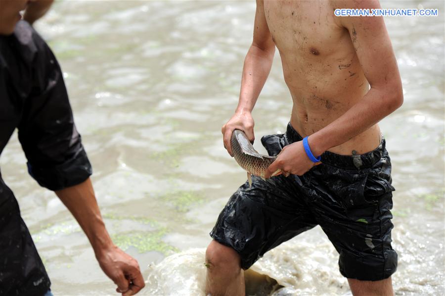 CHINA-GUIZHOU-MIAO ETHNIC GROUP-FISH-CATCHING CONTEST (CN) 