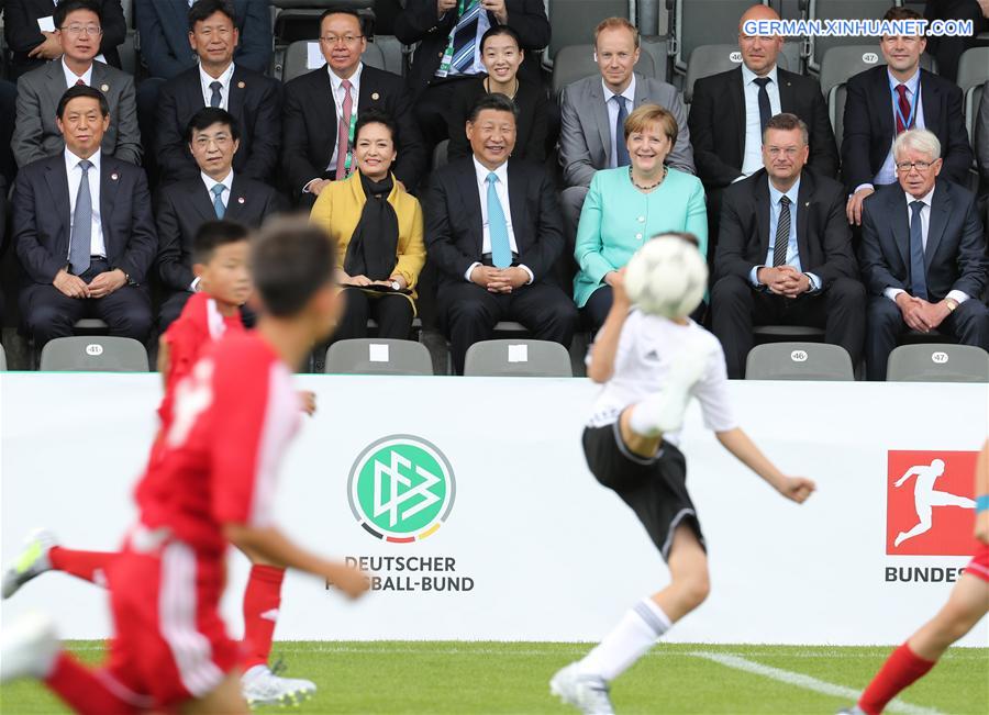 GERMANY-CHINA-XI JINPING-MERKEL-YOUTH FOOTBALL MATCH