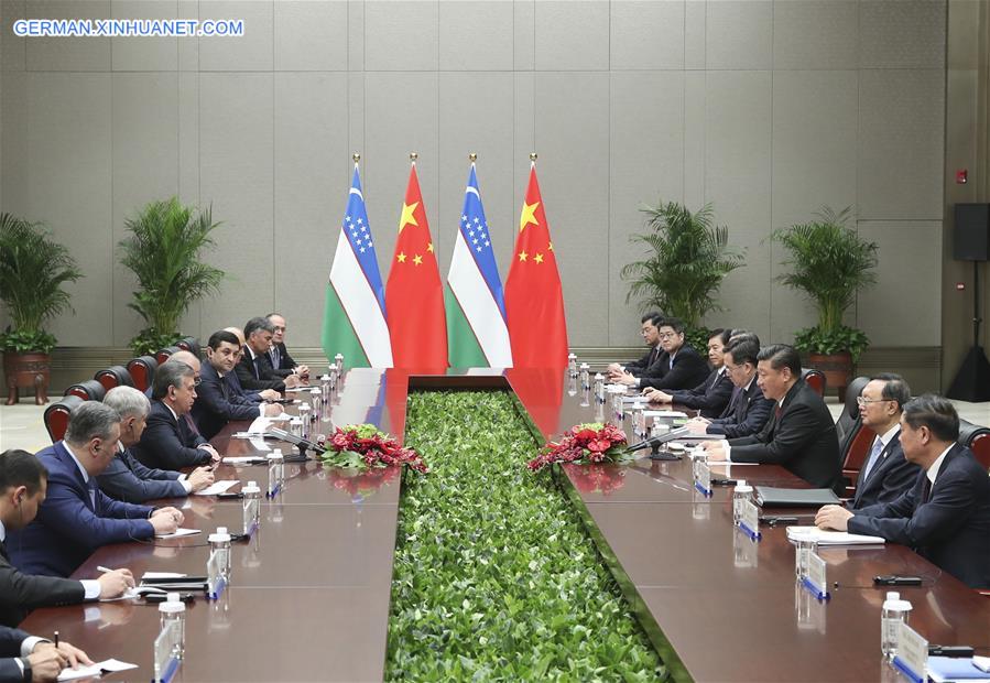 (SCO SUMMIT) CHINA-QINGDAO-XI JINPING-UZBEKISTAN-SHAVKAT MIRZIYOYEV-MEETING (CN)