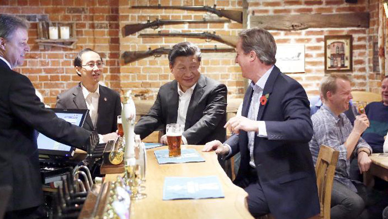 Xi Jinping trifft britischen Premierminister David Cameron