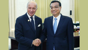 Li Keqiang trifft Laurent Fabius in Beijing