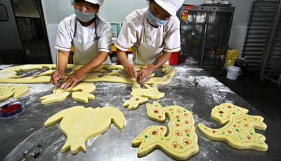 Tier geformte Mondkuchen in Gansu dargestellt