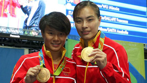 Wu Minxia und Shi Tingmao gewinnen die Goldmedaille beim Frauen Synchro-Wasserspringen Finale vom 3m Springbrett