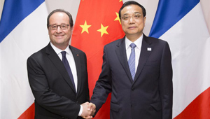Li Keqiang trifft französischen Präsidenten in New York