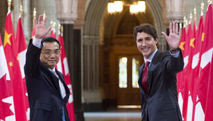 Li Keqiang und Justin Trudeau nehmen an Unterzeichnungszeremonie von Dokumenten zu bilateraler Zusammenarbeit teil