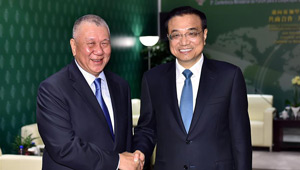 Li Keqiang trifft Ho Hau Wah in Macau
