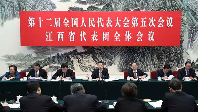 Zhang Gaoli nimmt an Podiumsdiskussion mit NVK-Delegierten aus der Provinz Jiangxi teil
