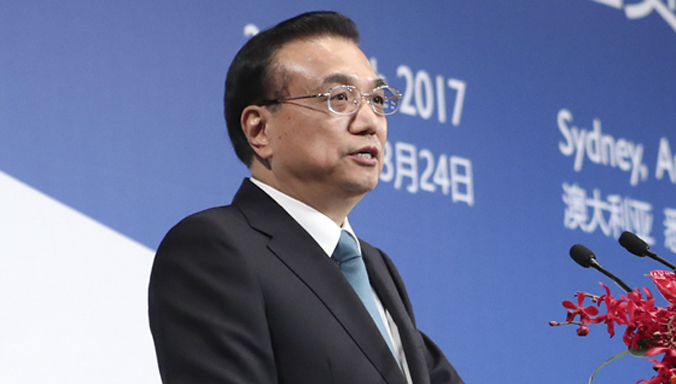 Li Keqiang hält beim China-Australia Cooperation on Economy and Trade Forum eine Rede