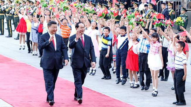 Xi Jinping führt Gespräche mit dem vietnamesischen Präsidenten Tran Dai Quang in Beijing