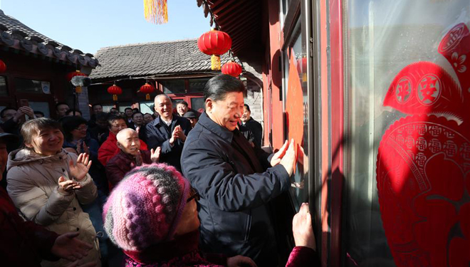 Xi besucht vor Frühlingsfest Kader, Anwohner in Beijing