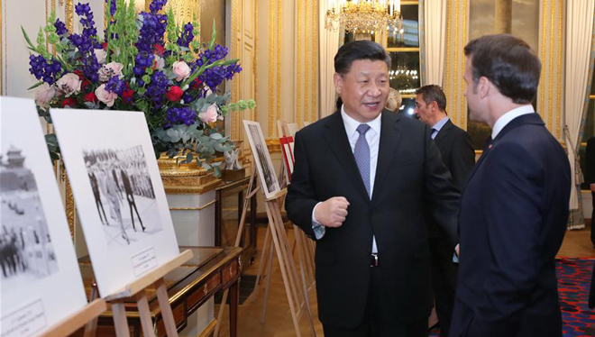 Xi Jinping und Macron besuchen Fotoausstellung im Élysée-Palast